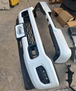 Alternative view of white ram 2500 front and rear bumpers